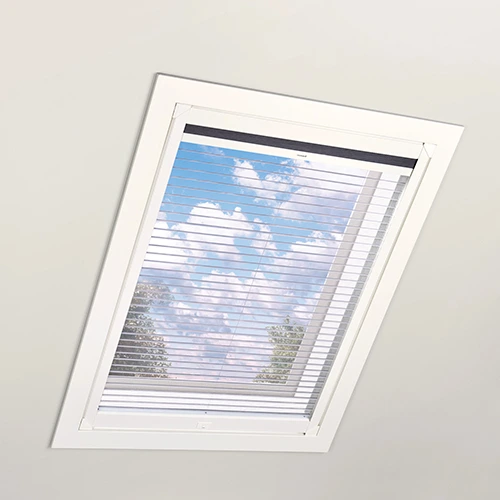 Shades for skylight windows with sheer fabric